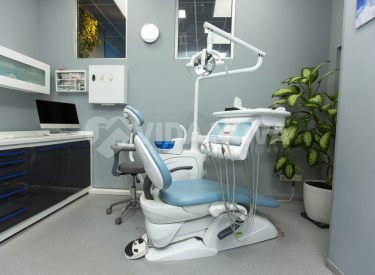 dental cabinet with various medical equipment