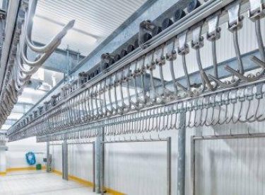 depositphotos_387681230-stock-photo-meat-hanging-hook-industrial-loading