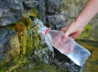 depositphotos_5504633-stock-photo-source-of-spring-water-bottle