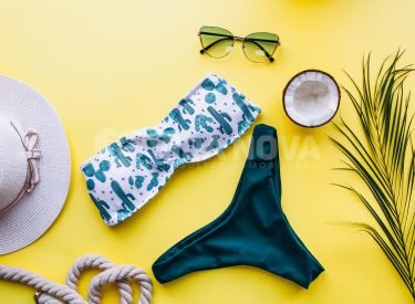 Swimsuit on yellow background isolated